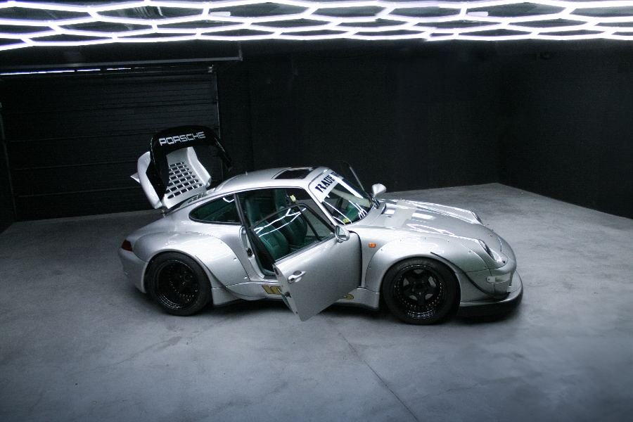 RWB Porsche 993 widebody side profile with doors open