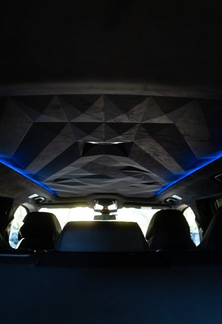 BMW XM Alcantara starlight headliner with blue ambient lighting